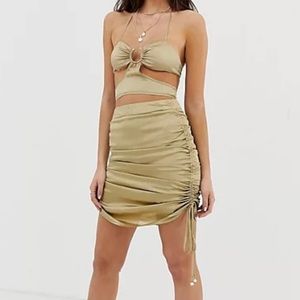 New ZYA mini skirt with ruched sides size small in champagne with pearl detail